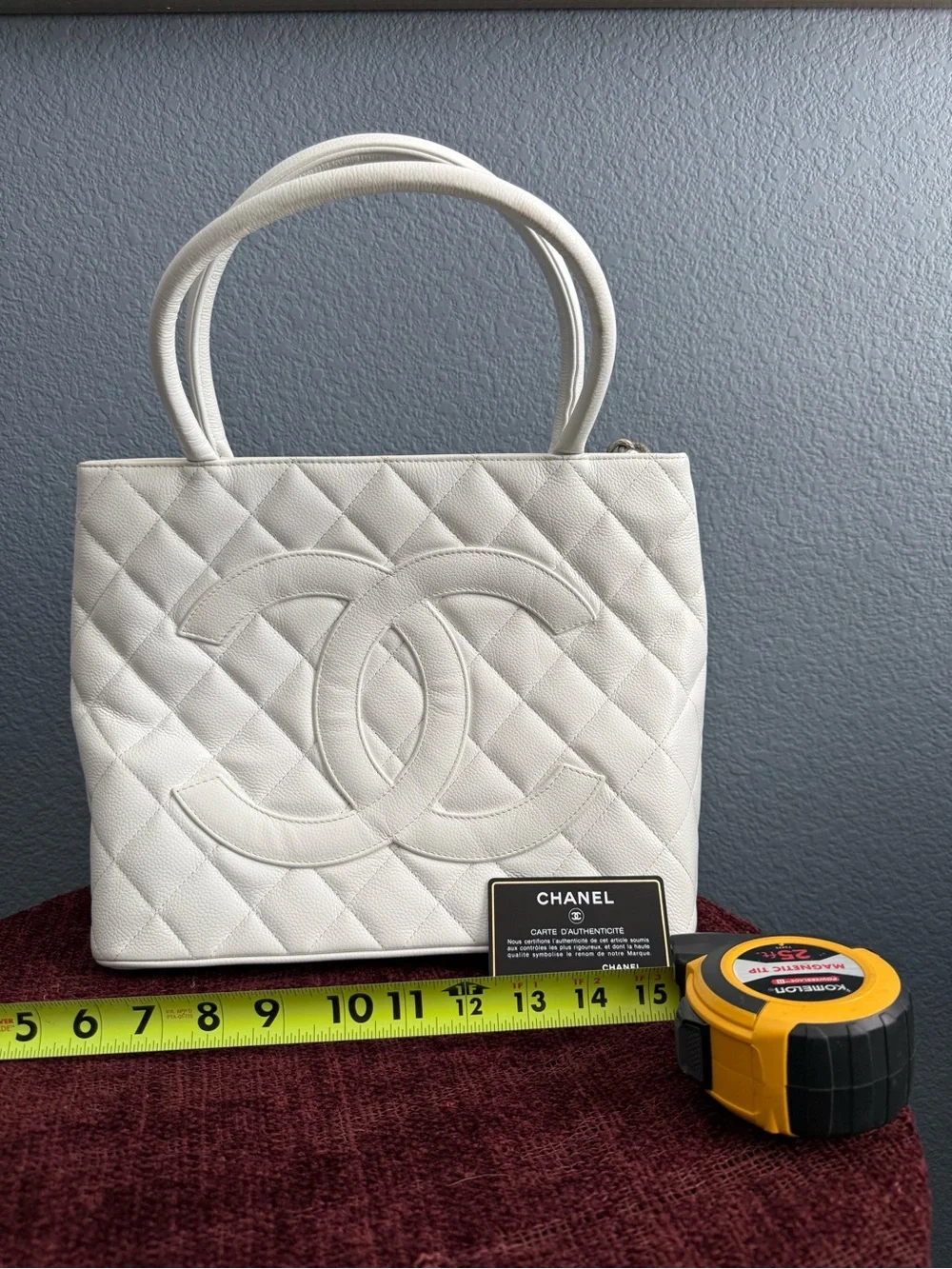 CHANEL Caviar Quilted Leather Tote with Silver Medallion